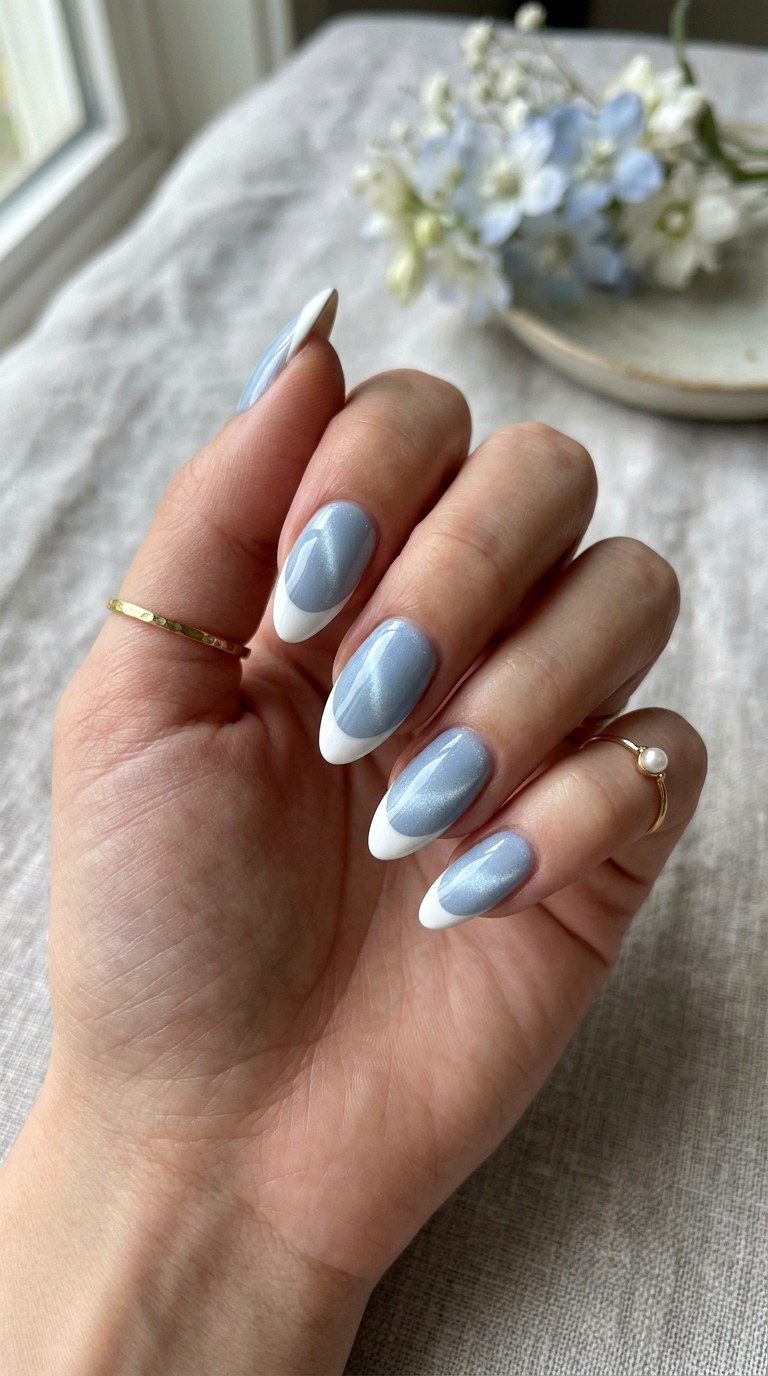 Baby Blue Cat Eye with French Tips - 20 Summer Baby Blue Cat Eye Nails Ideas