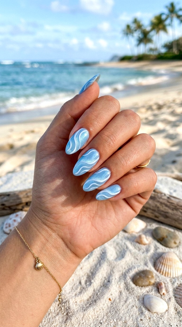 Baby Blue Cat Eye with Wave Patterns - 20 Summer Baby Blue Cat Eye Nails Ideas