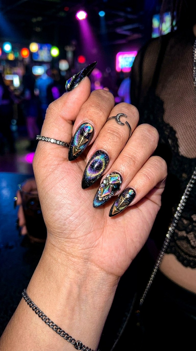 Black Cat Eye with Bold Crystal Statement - 21 Summer Crystal Accent Cat Eye Nails Ideas