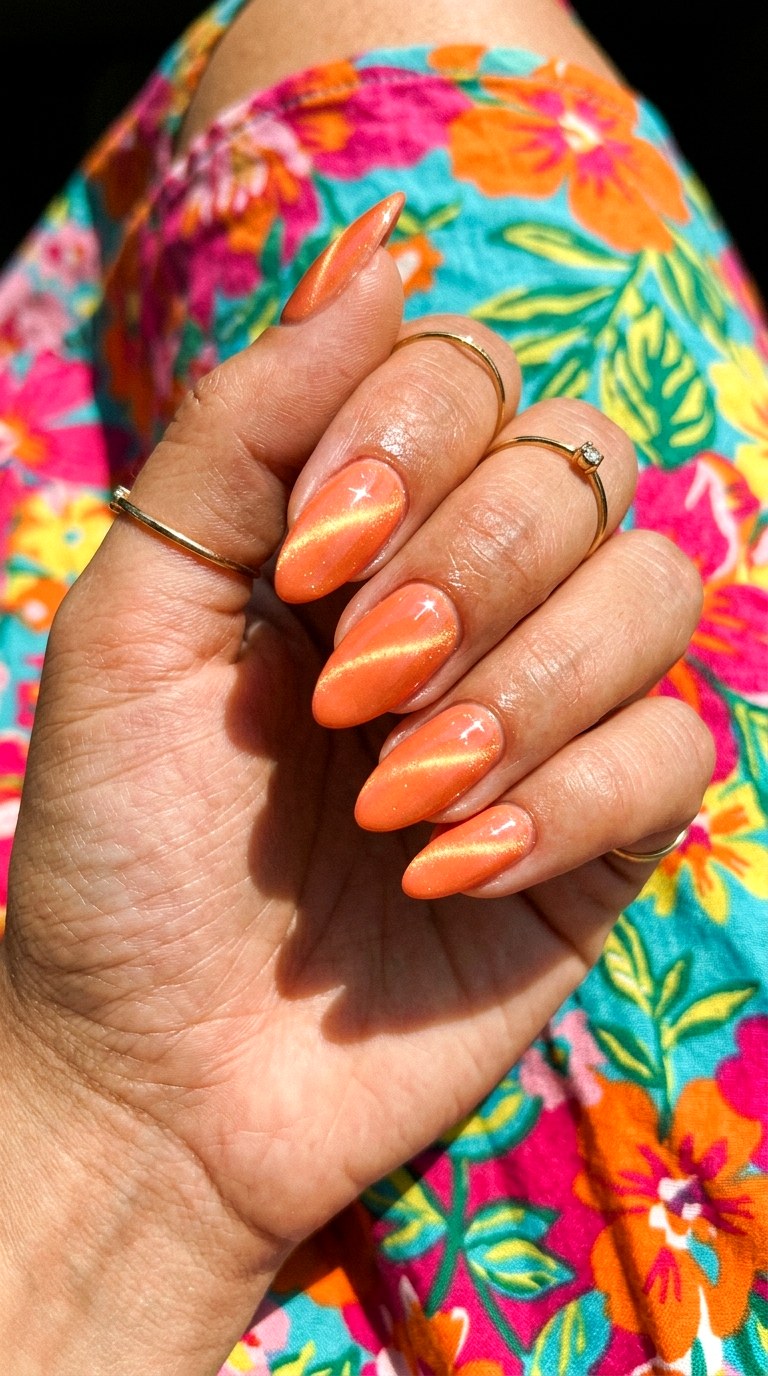 Bold Peach Cat Eye with Intense Magnetic Glow - 22 Summer Peach Cat Eye Nails Ideas