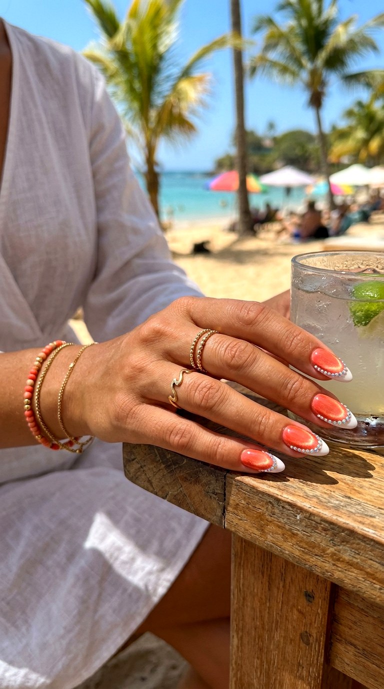 Coral Cat Eye with Crystal Tips - 21 Summer Crystal Accent Cat Eye Nails Ideas