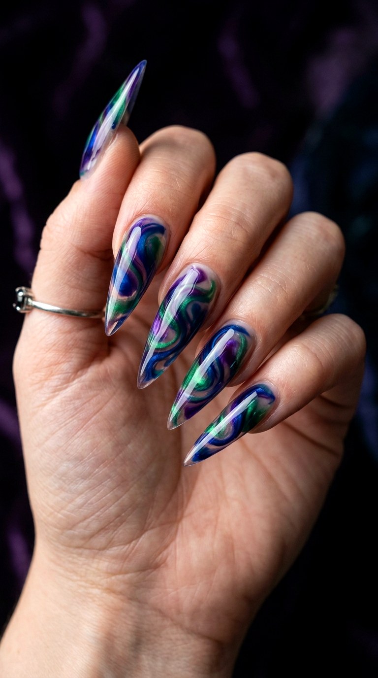 Multicolor Jewel Tone Stiletto Swirls - 29 Festive Spring Multicolor Acrylic Nails