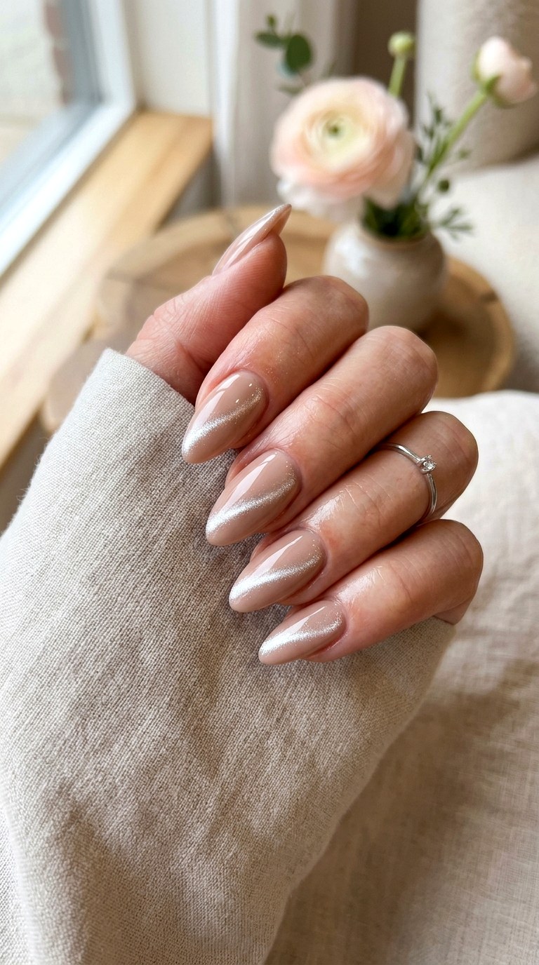 Nude Base with Silver Cat Eye Stripe - 20 Spring Nude Base Cat Eye Nails Ideas