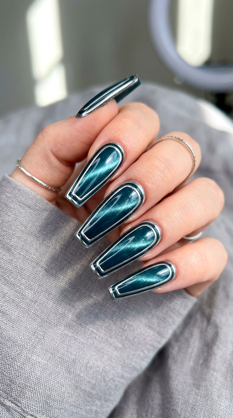 Teal Cat Eye with Double Chrome Border - 22 Summer Chrome Outline Cat Eye Nails Ideas