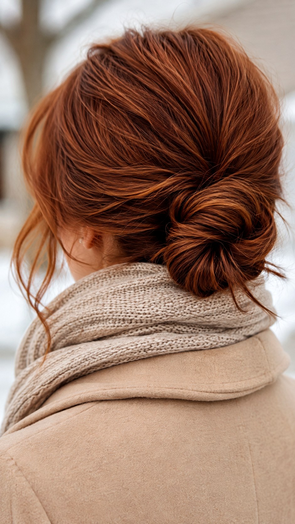 Auburn Textured Knotted Bun - 21 elegant bun hairstyles classy ideas