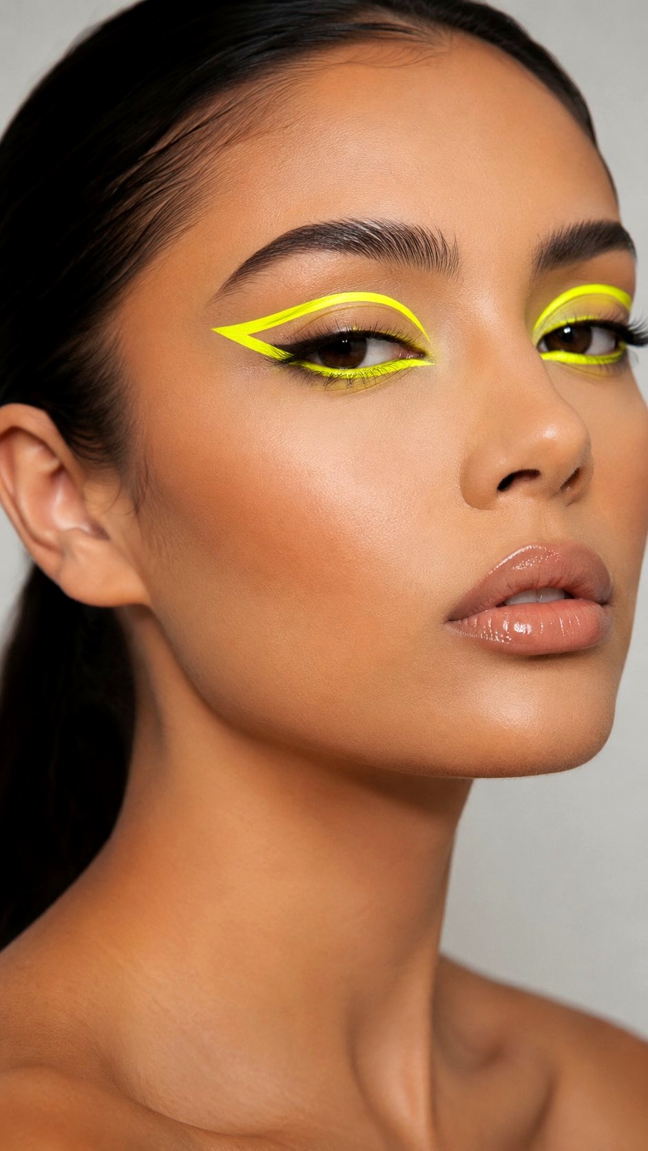 Bold Neon Graphic Eyeliner Statement - 21 Summer Makeup Looks