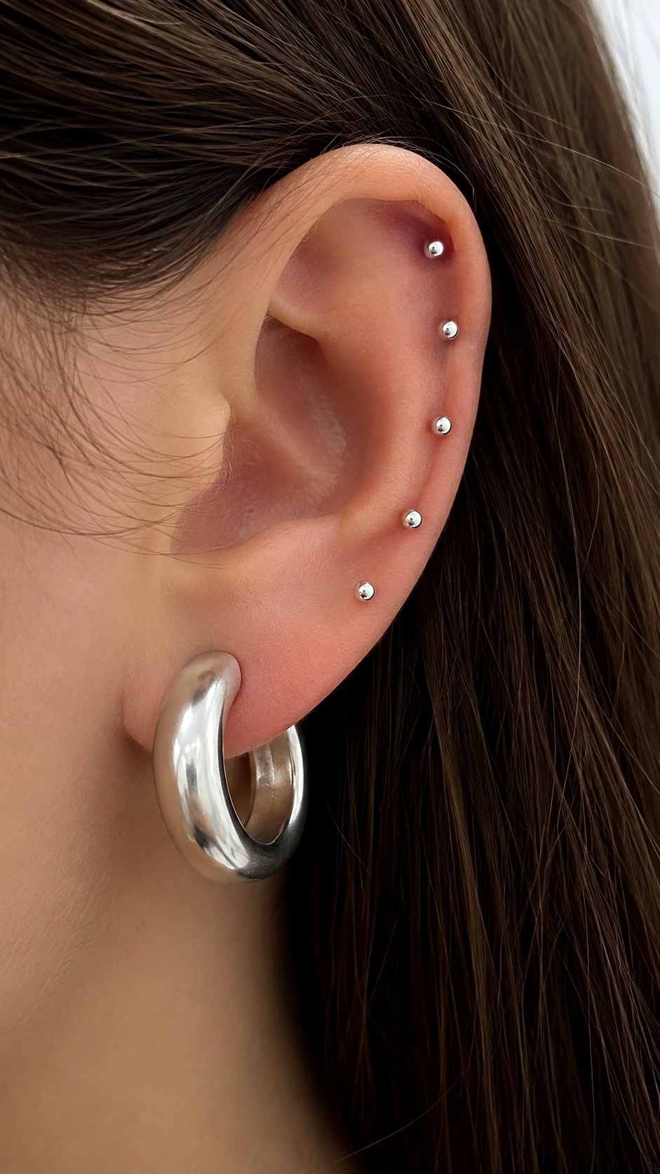 Chunky Hoop Paired With Micro Studs - 21 Silver Earrings Stack Ideas