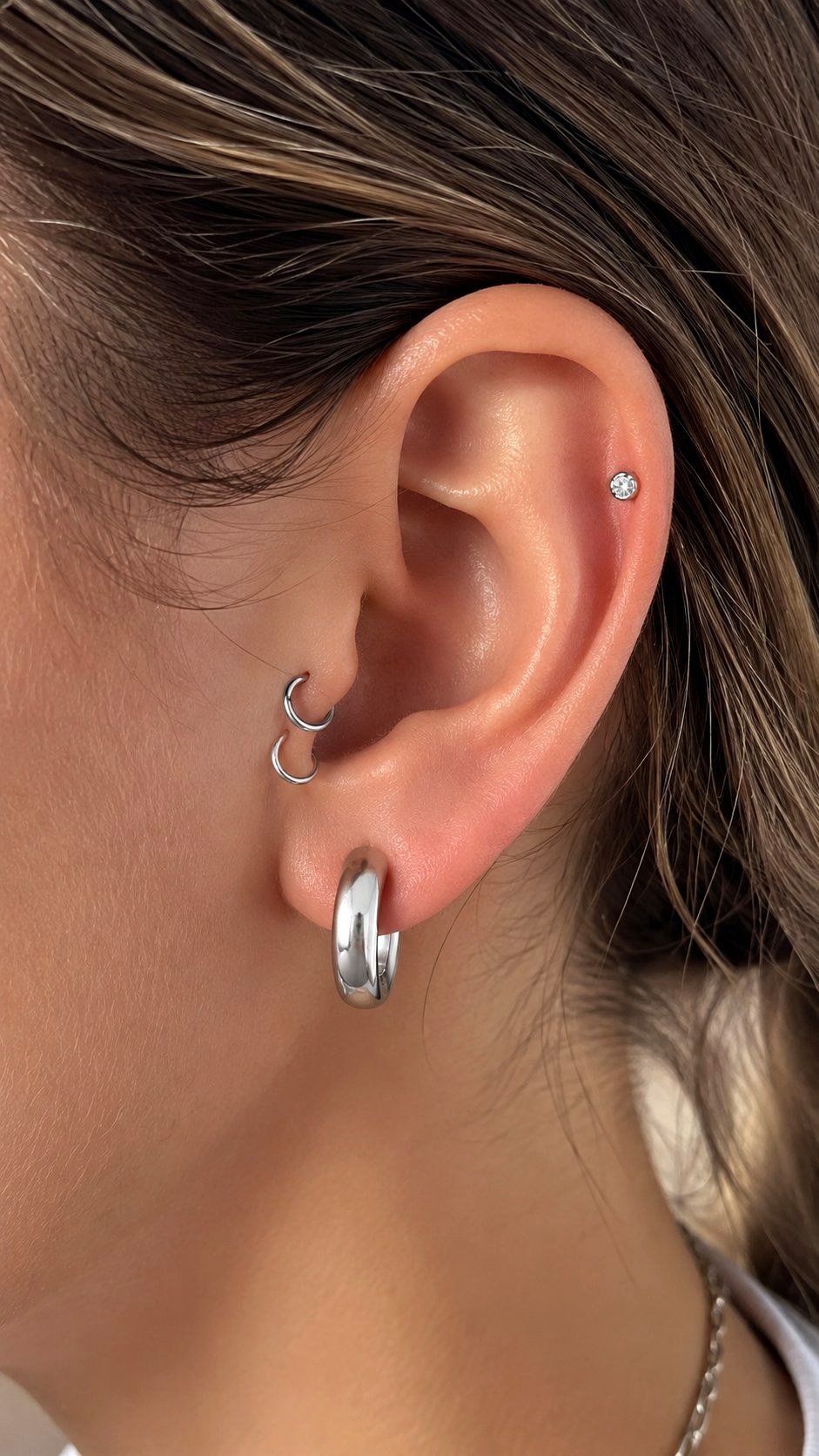 Double Tragus Tiny Silver Hoops - 21 Silver Earrings Stack Ideas