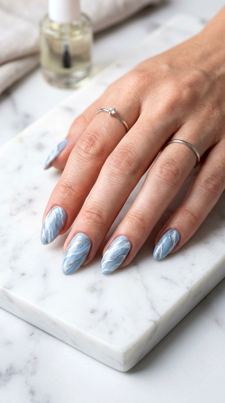 Marble Swirls In Powder Blue - 24 Powder Blue Gel Nail Ideas