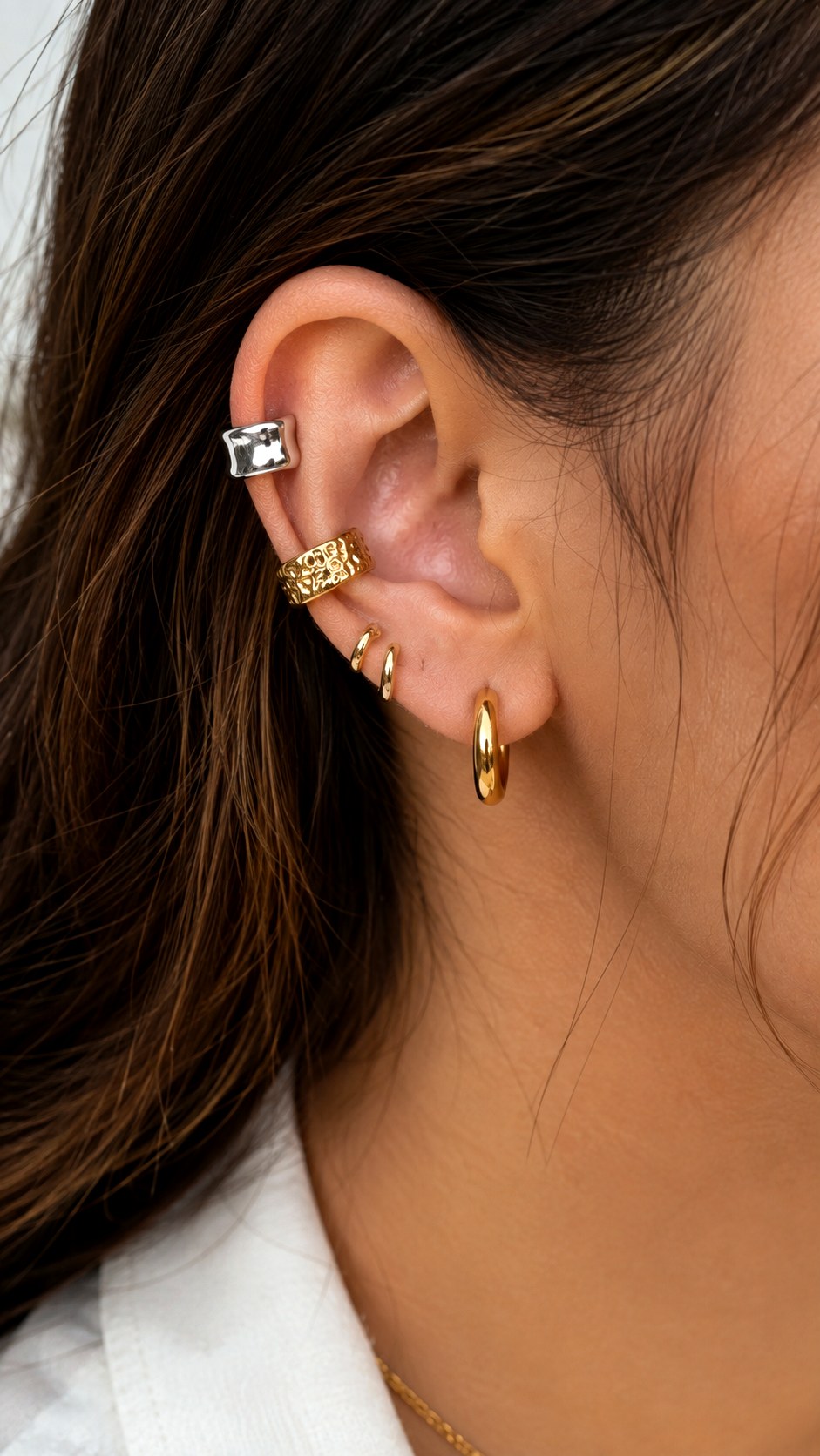Multiple Ear Cuffs in Contrasting Metals - 24 gold vs silver jewelry ideas