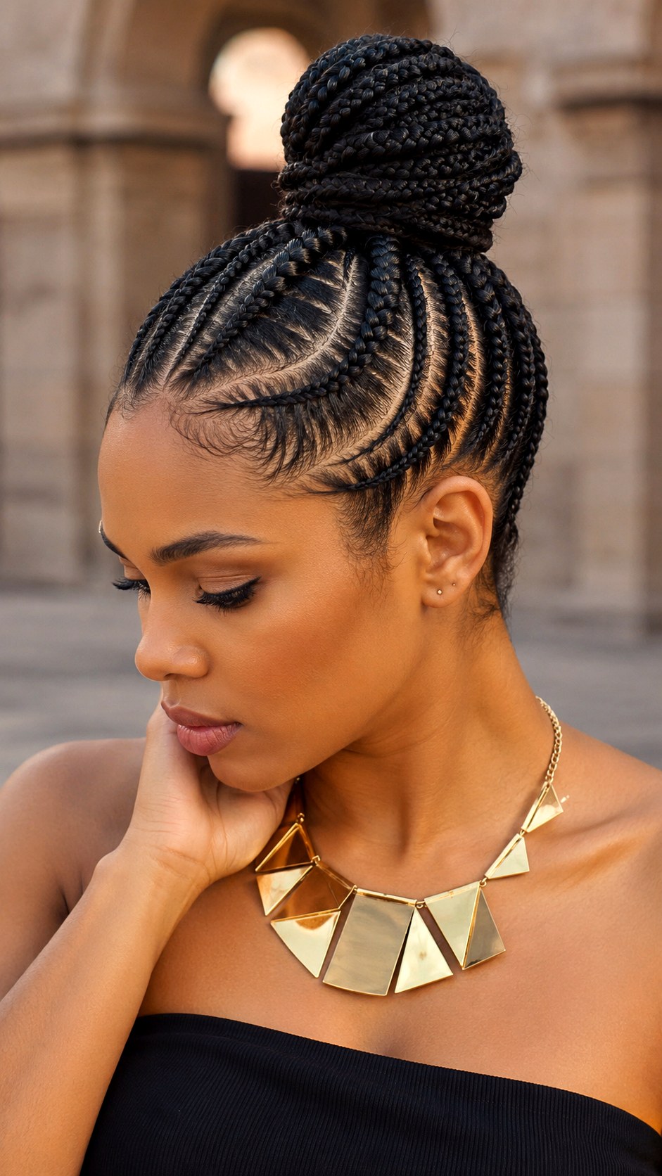 Sleek Cornrow Braided Top Knot - 23 elegant bun hairstyles classy ideas