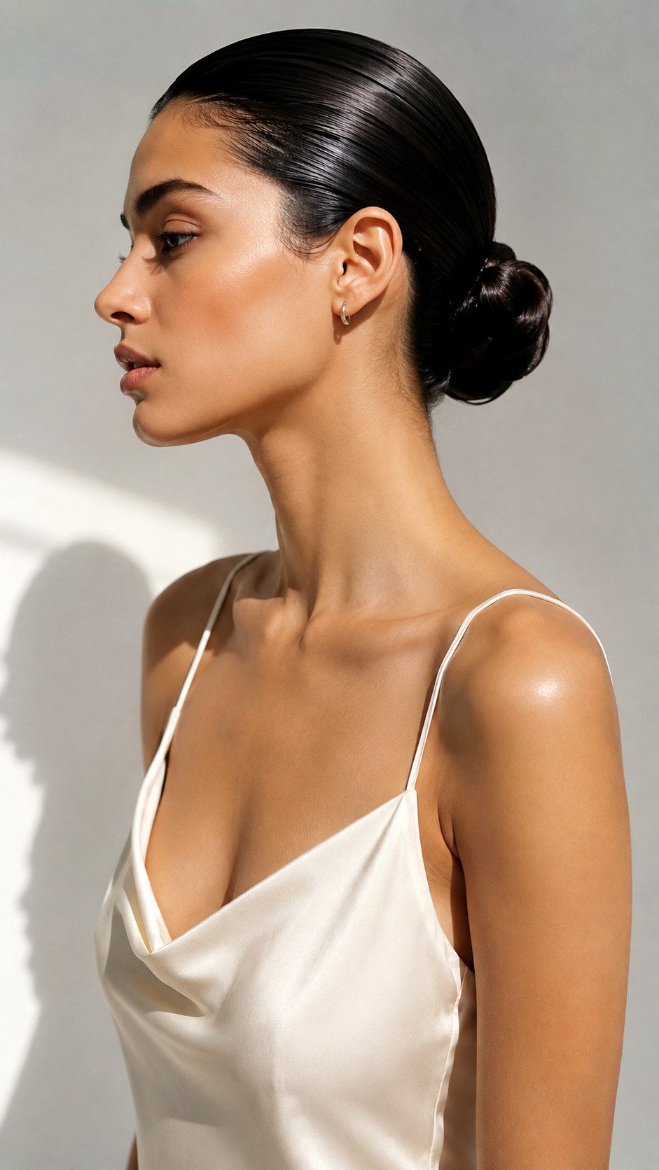 Slicked Back Modern Low Bun - 23 low bun prom hairstyles ideas